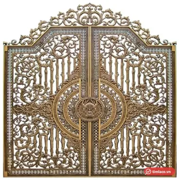 Cổng nhôm đúc 2 cánh hoa văn dây lá, giữa có huy hiệu đúc nổi, màu đồng (ảnh minh hoạ dòng hàng)