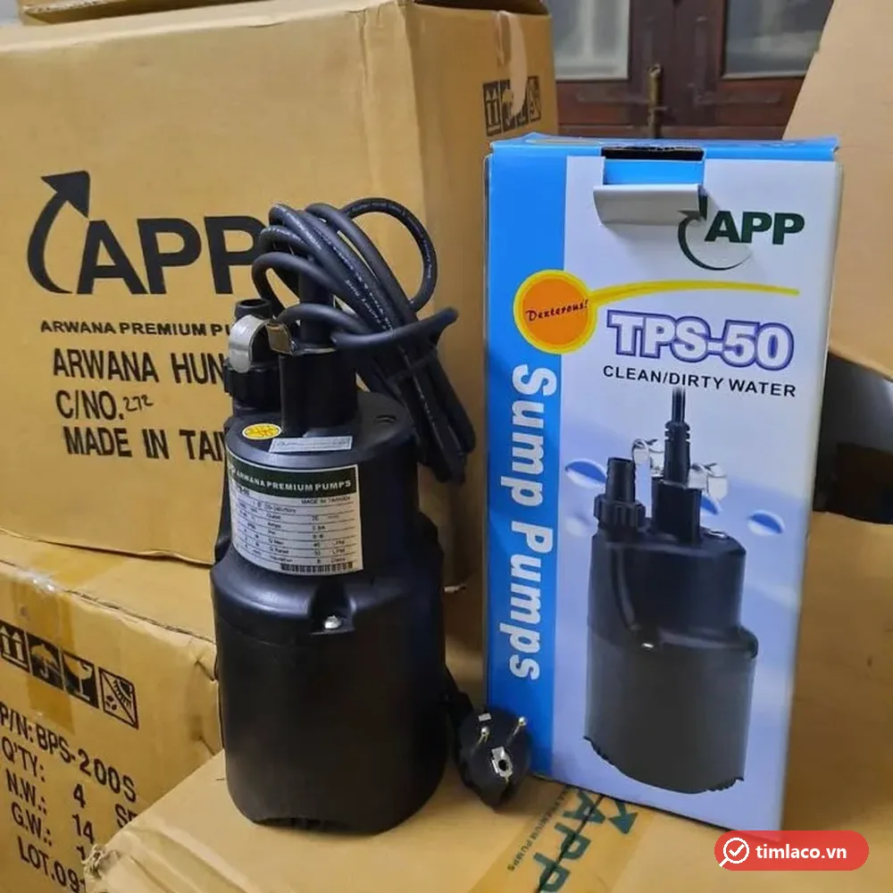 Máy bơm chìm APP TPS-50 thân đen đặt cạnh hộp máy in TPS-50 Sump Pumps