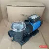 Máy bơm hồ bơi Ewala STP100 động cơ xanh, buồng lọc rác nắp trong, cạnh thùng in mã STP100