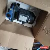 Máy bơm Panasonic GP-10HCN1SVN 1HP đặt trong thùng, đầu bơm xanh và tem nhãn trên hộp điện