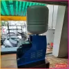 Máy bơm tăng áp APP dòng HOME vỏ chụp xanh, bình tích áp phía trên (ảnh minh hoạ dòng hàng)